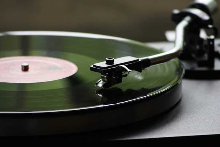 Record Skipping? How Tonearm Adjustments Can Save Your Vinyl 5 Vintage vinyl record on turntable for music enthusiasts and collectors.